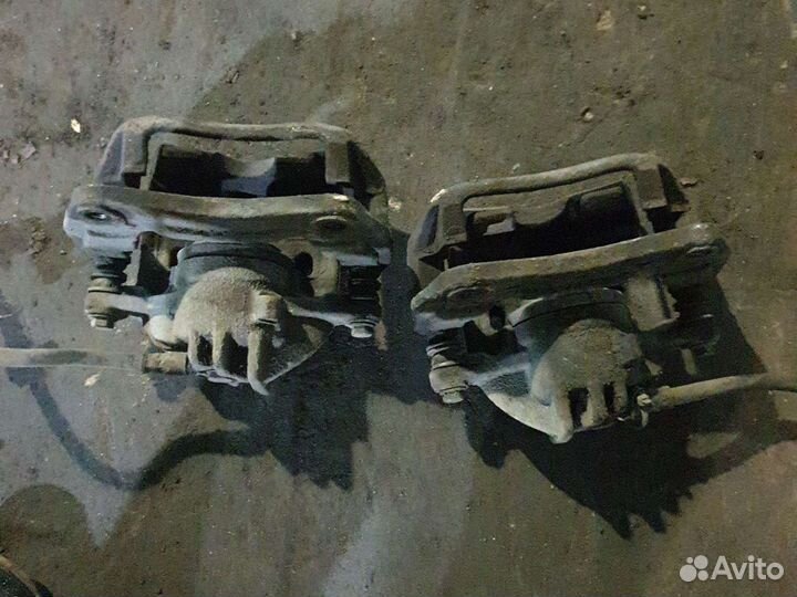 Передние суппорта митсубиси каризма