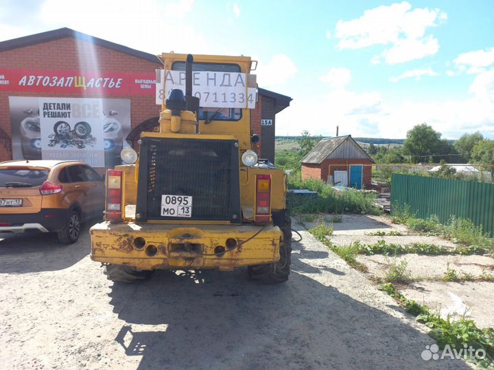 Аренда фронтального погрузчика услуги трактора