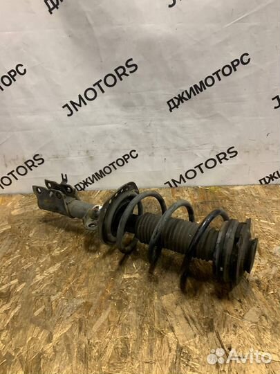 Амортизатор передний левый Nissan X-Trail T31