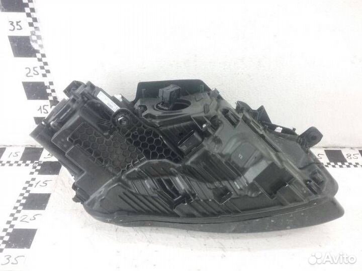 Фара левая Volkswagen Touareg