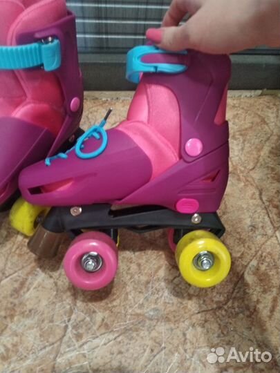 Роликовые коньки