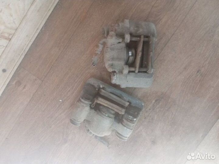 Суппорт тормозной задний Chery Tiggo T11 2009