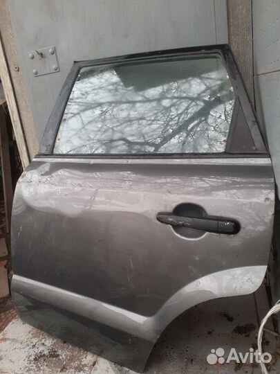 Задняя левая дверь Hyundai Tucson 1