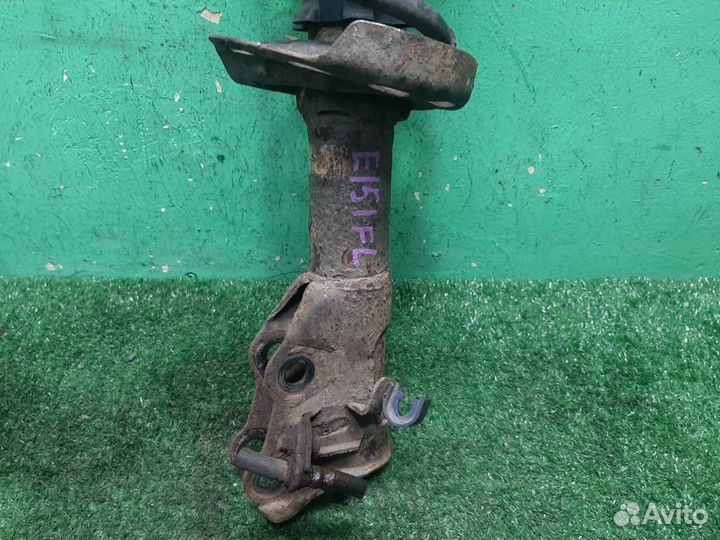 Стойка амортизатора передняя левая Honda Civic 4D