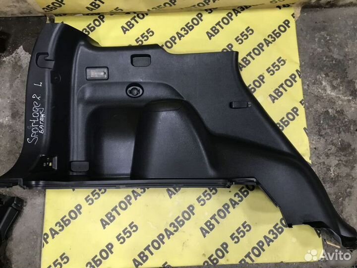 Обшивка багажника L Kia Sportage 2