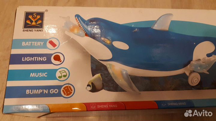 Дельфин игрушка музыкальная