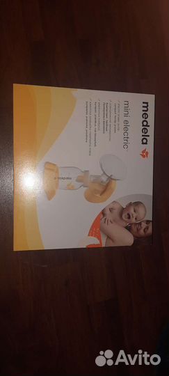 Молокоотсос Medela mini electric