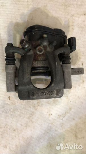 Суппорт задний правый Nissan X-trail T32 оригинал