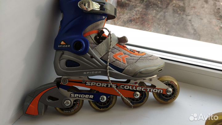 Роликовые коньки