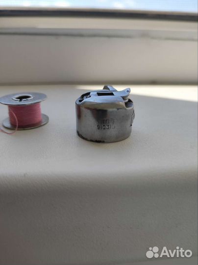 Шпульный колпачок