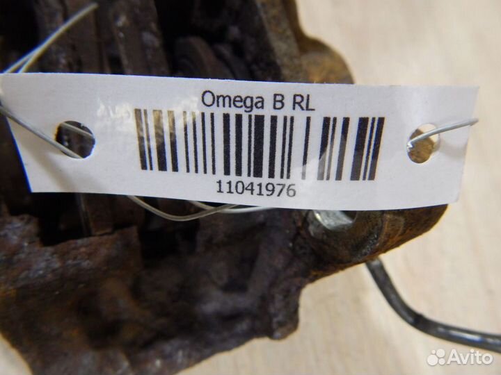 Суппорт задний левый Опель Омега Б