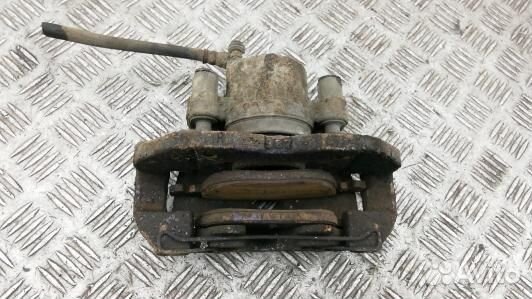 Суппорт тормозной передний левый mazda 3 2 (91L25K