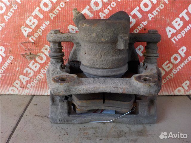 Суппорт передний левый Nissan Almera G15 K4MA490