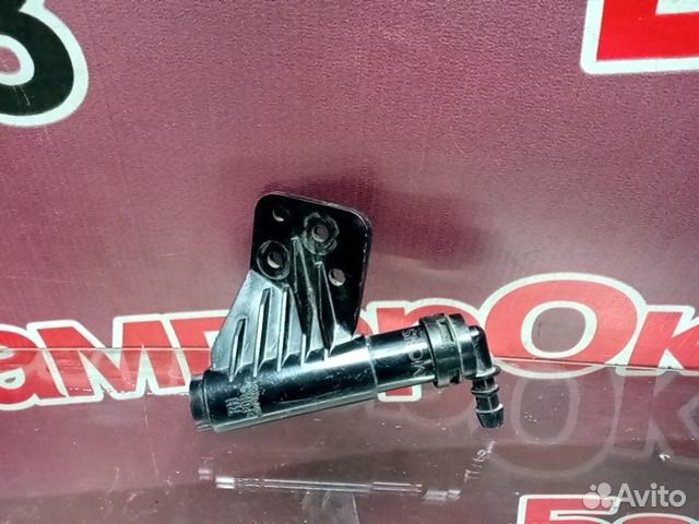 Форсунка омывателя фары передняя Kia Sportage