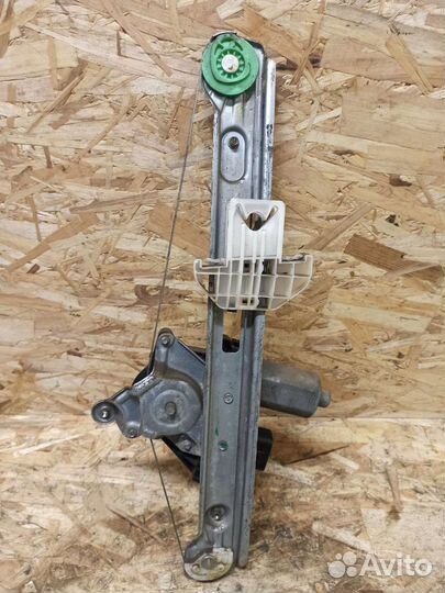 Моторчик задний левый Ford Focus 1