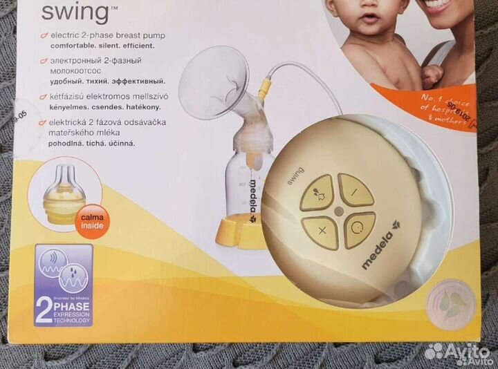 Молокоотсос medela электрический