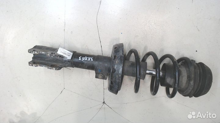 Амортизатор подвески левый передний Opel Astra G