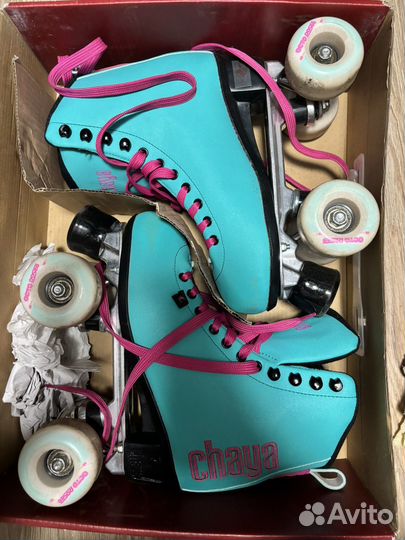 Роликовые коньки