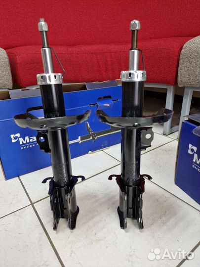 Передние стойки Opel Corsa C