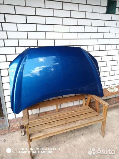 Капот на chevrolet aveo 2013 года