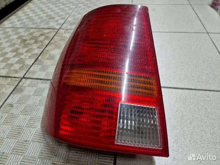 Фонарь задний левый VW Golf 4 Универсал оригинал