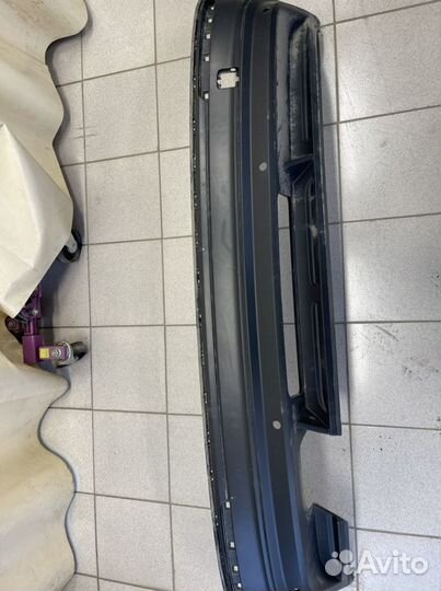 Спойлер черный заднего бампера