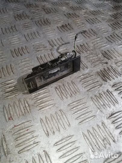 Фонарь подсветки номера Opel Astra H L69 Z18XER