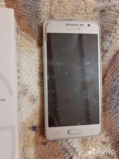 Телефон Samsung Galaxy Grand Prime