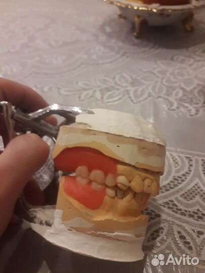 Зубной техник