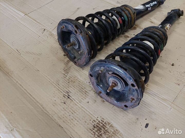 Амортизатор передний Nissan Primera P11