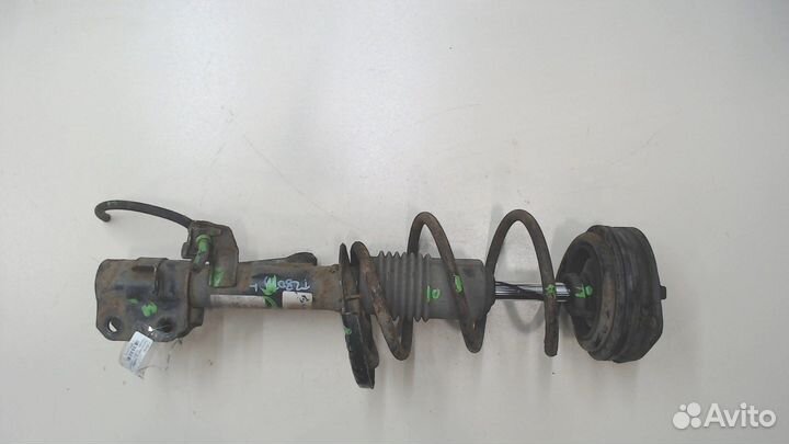 Амортизатор подвески Nissan Note E11, 2006