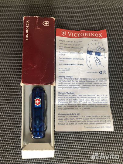 Карманный,нож от Victorinox С фонариком и ручкой