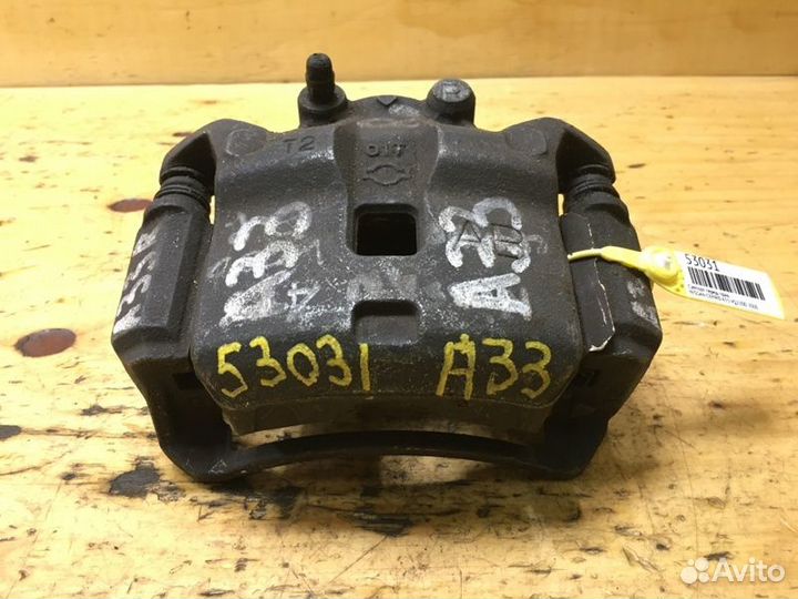 Суппорт передний правый Nissan Cefiro A33 VQ25DD