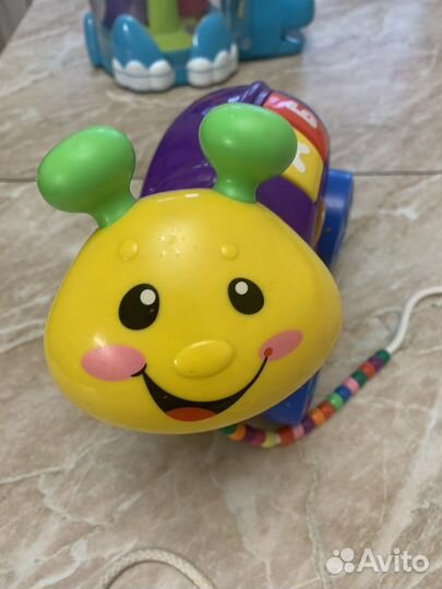 Улитка fisher price музыкальная игрушка