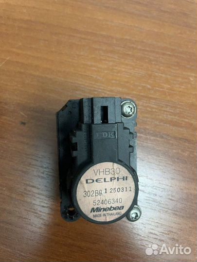 Моторчик заслонки отопителя Opel Astra H