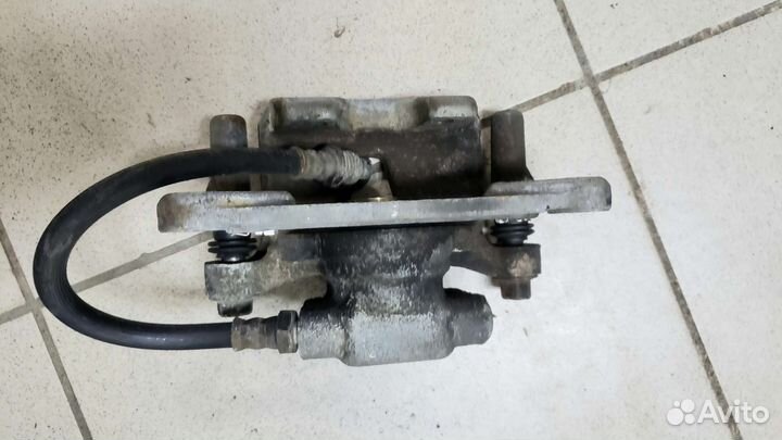 Суппорт задний Mitsubishi outlander xl