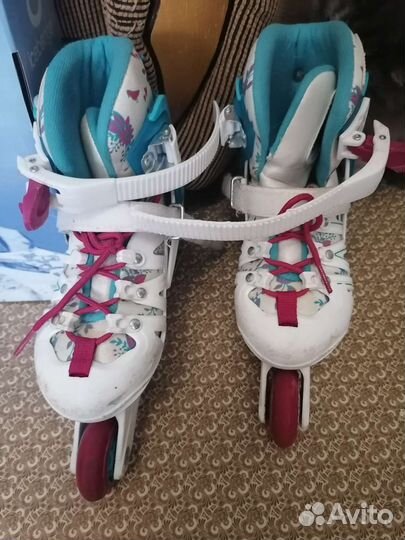 Роликовые коньки