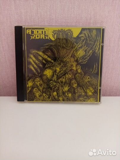 Atomic Roar – Never Human Again CD