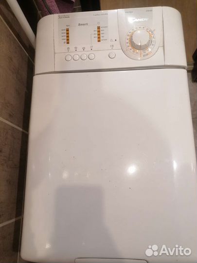Стиральная машина Candy с вертикальной загрузкой
