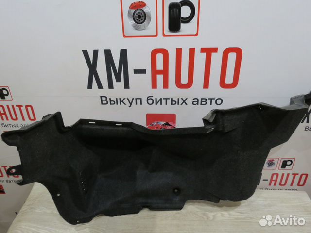 Обшивка багажника правая Toyota Corolla 150