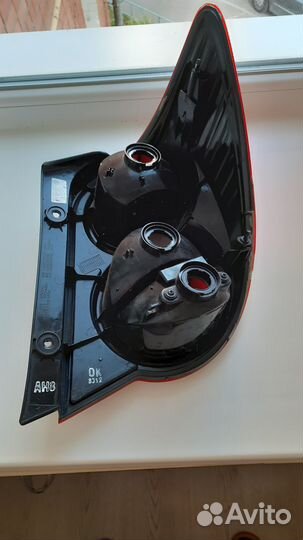 Фонарь задний (левый) Chevrolet Aveo T300 оригинал