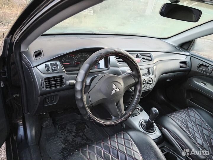 Mitsubishi Lancer 1.3 МТ, 2006, 325 800 км