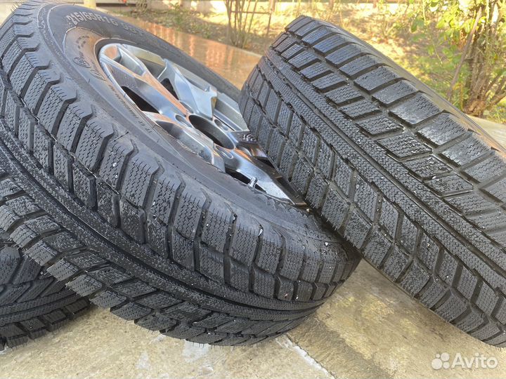 Зминяя резина с дисками на ниву трэвэл