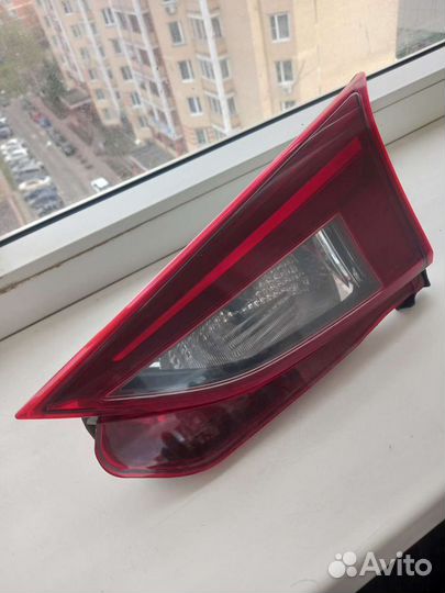 Фонарь в крышку багажника mazda3. 2014год