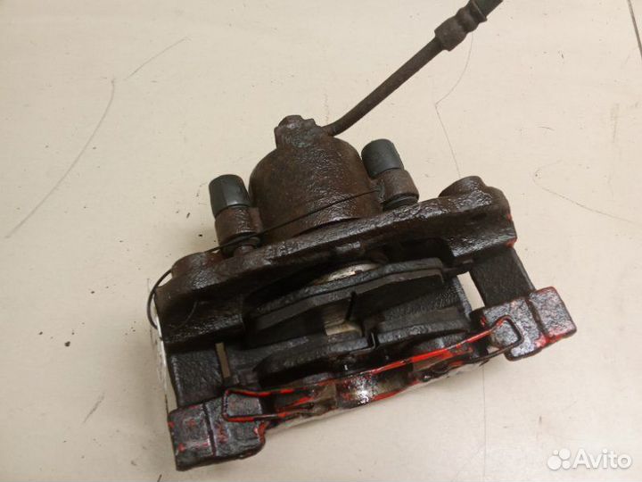 Суппорт тормозной передний правый Dodge Stratus