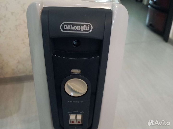 Масляный обогреватель delonghi