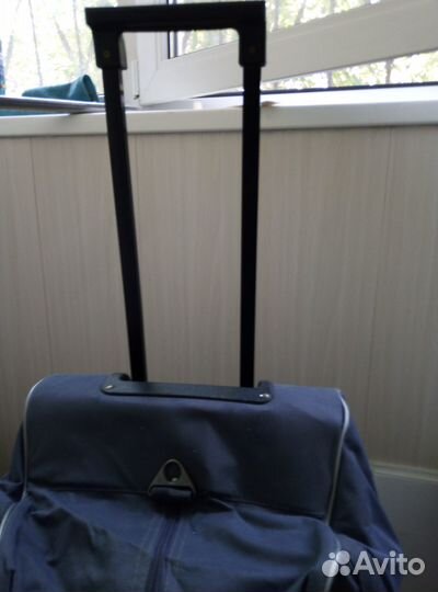 Сумка дорожная на колесах с выдвижной ручкой