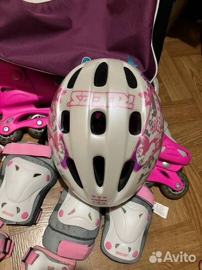 Роликовые коньки