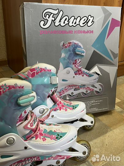 Роликовые коньки