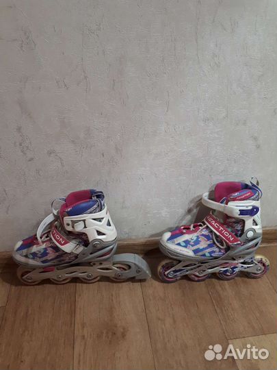 Роликовые коньки